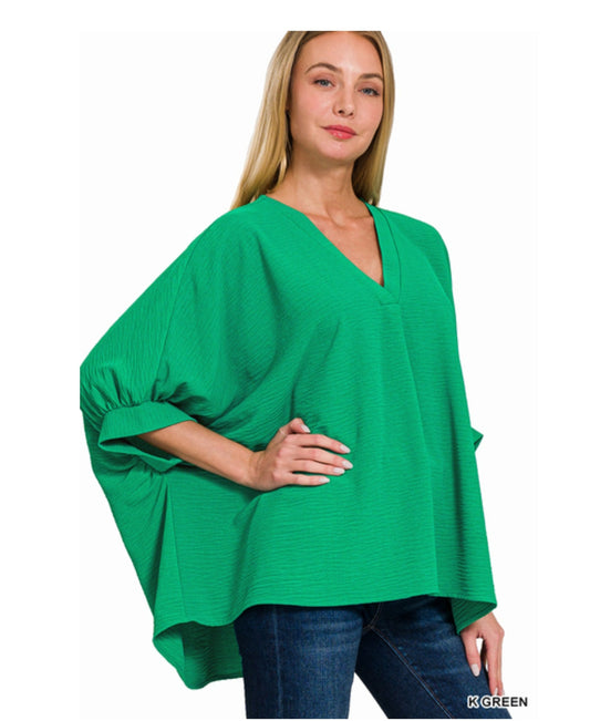 Woven airflow v-neck puff half sleeve top